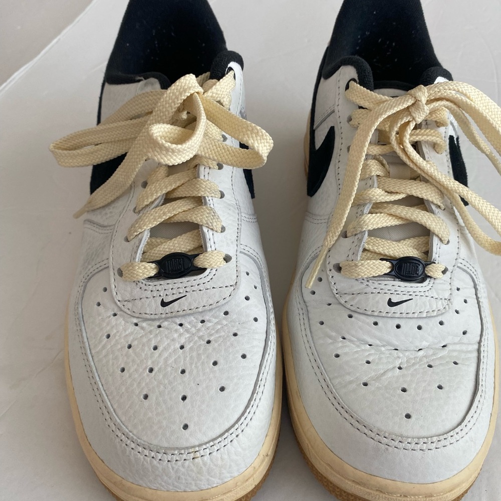 Nike White and Black Sneakers with Cream Laces
